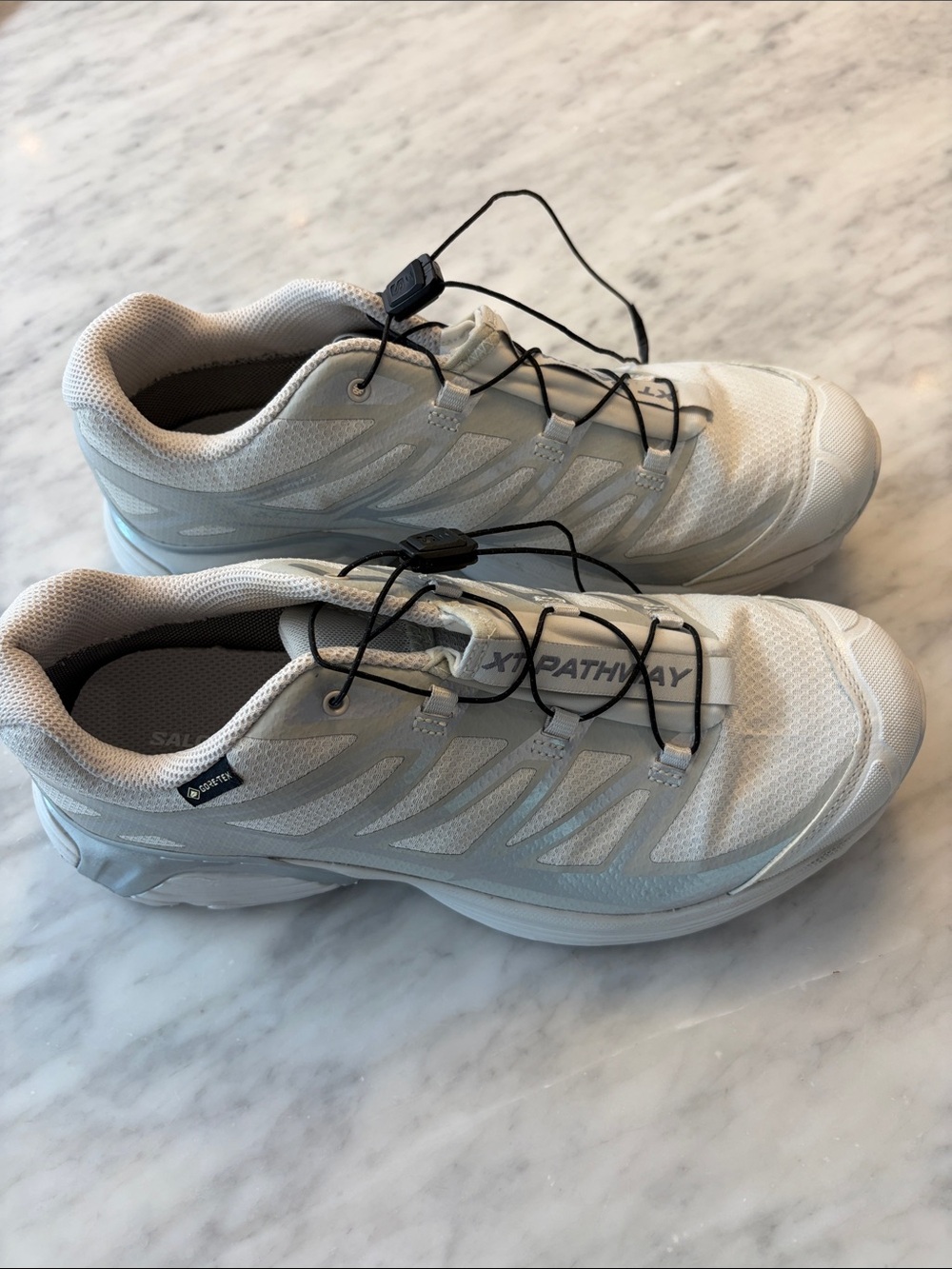 Salomon Women's Sneakers in White and Light Gray with Quick-Pull Lacing
